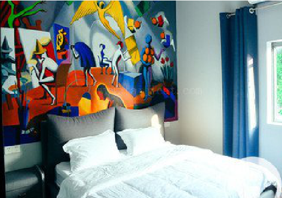  九龙对于酒店的墙体彩绘而言更注重哪些方面？